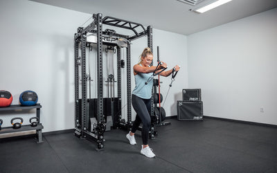 An athlete using Ares 2.0 for cable exercises